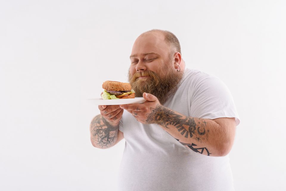 Man enjoying a burger