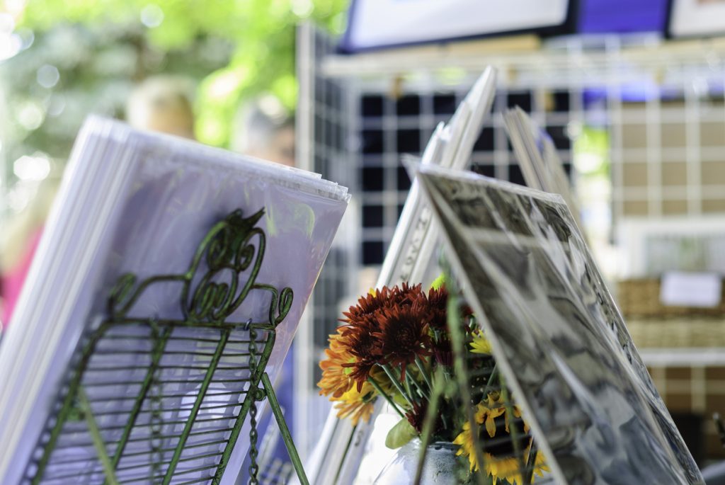 Flowers and photographs at art events